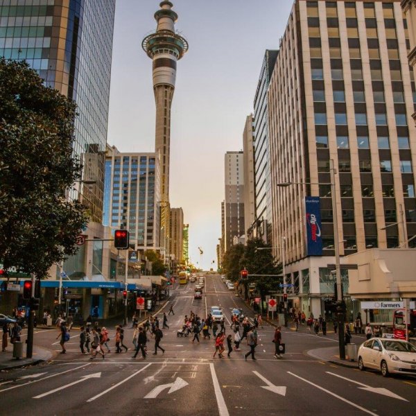 People crossing the intersection of Queen and Victoria Streets in Auckland's city centre. Image: Sacha Stejko