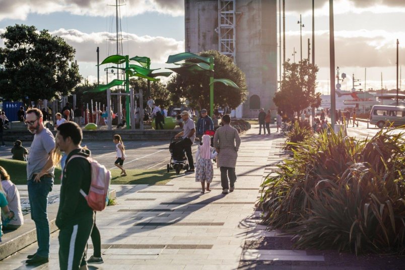 Families enjoying leisure time in the Silo Park playground in Wynyard Quarter, Auckland's city centre. Image: Sacha Stejko.