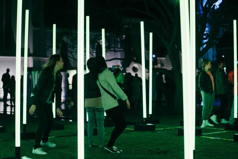 People interacting with James Russell's Light Field, part of Urban Art Village for Artweek 2017 in Auckland's city centre. Image: Sacha Stejko.