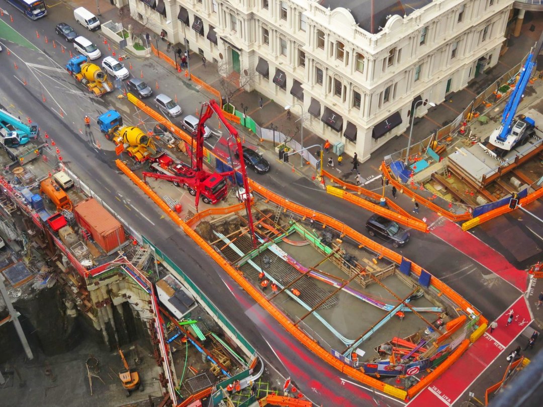 Birds eye view of CRL construction being done on Albert Street in Auckland City Centre around heritage buildings such as DFS Galleria, pedestrians and traffic
